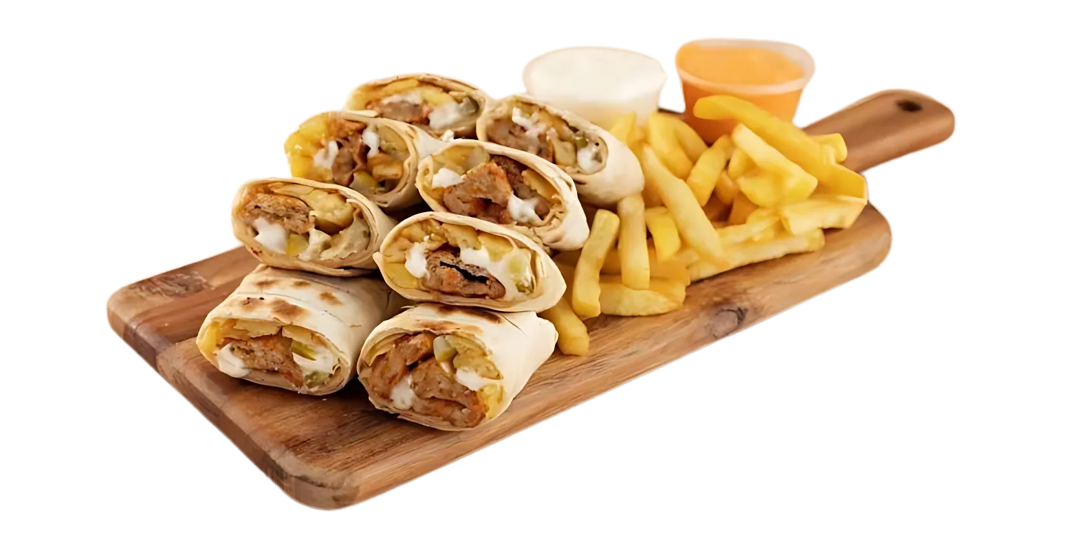 Shawarma wraps and fries on a wooden board